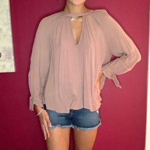 Mauve colored blouse